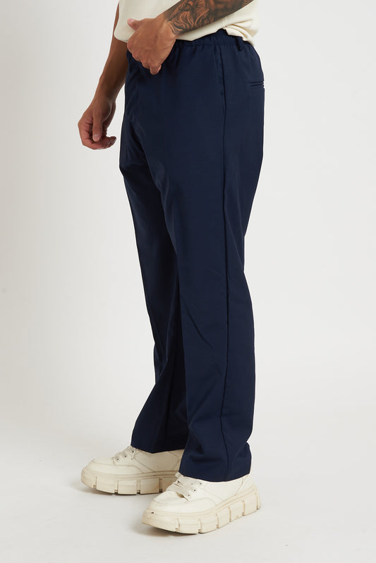 Pantalone a fondo largo