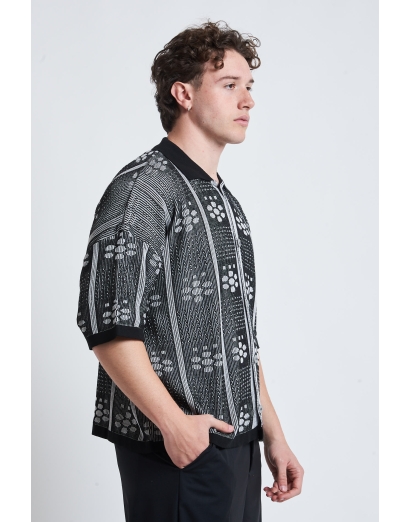 Cardigan traforato con disegno