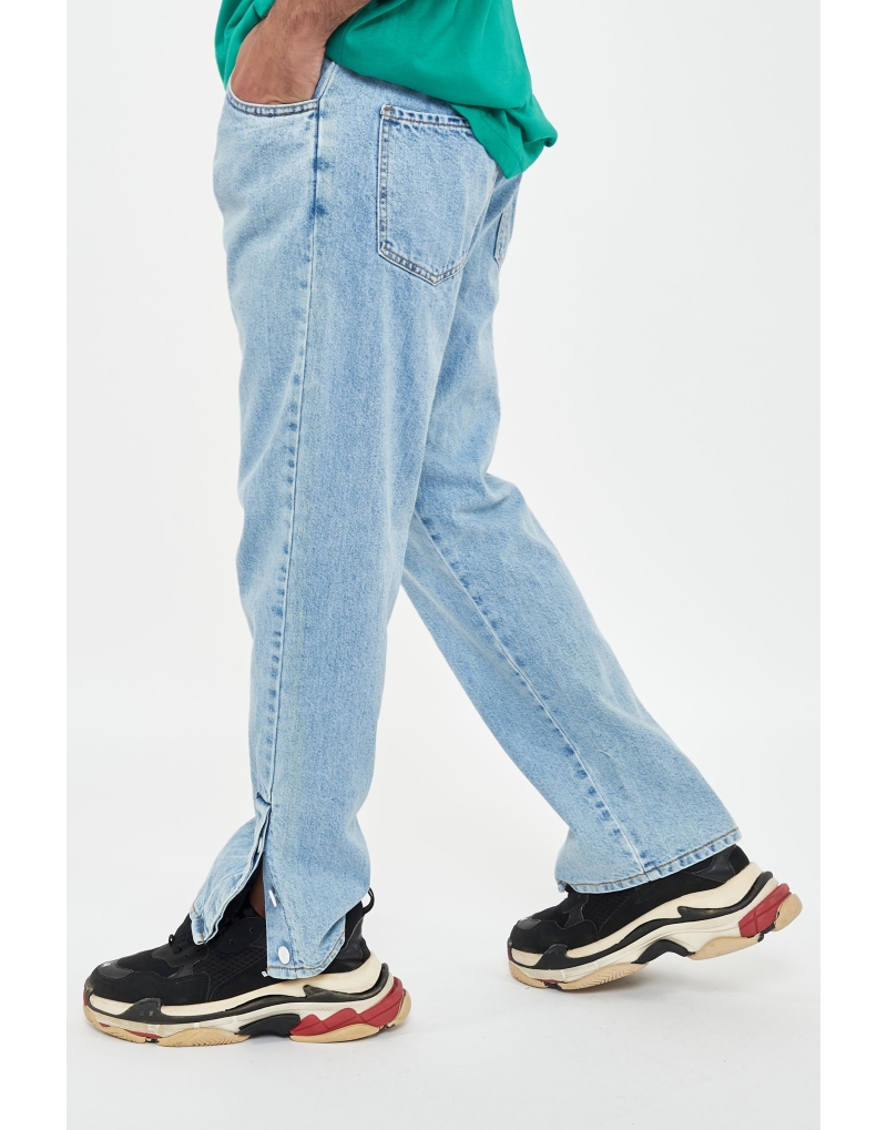 Jeans fondo largo con aperture