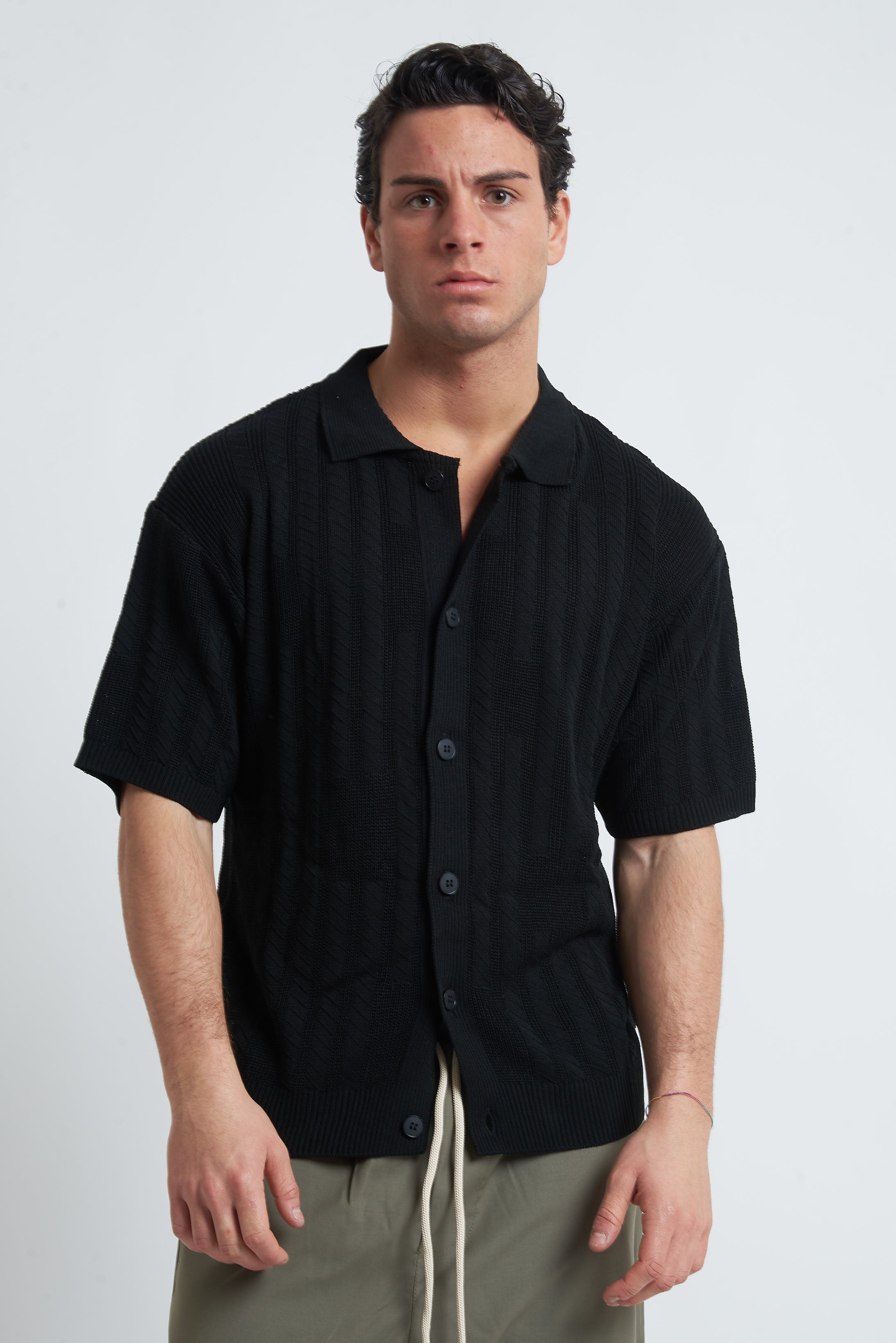 Cardigan traforato unito