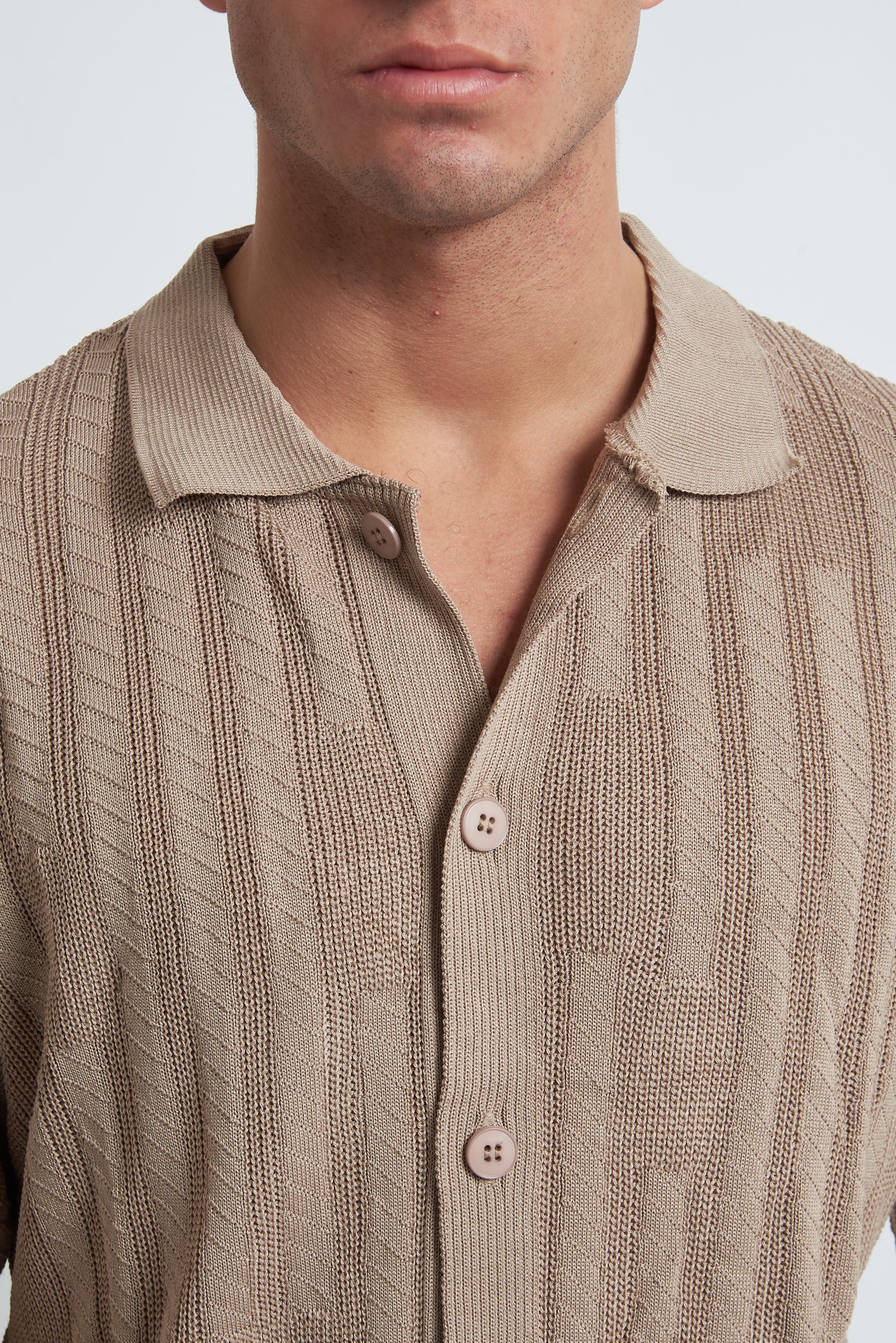 Cardigan traforato unito