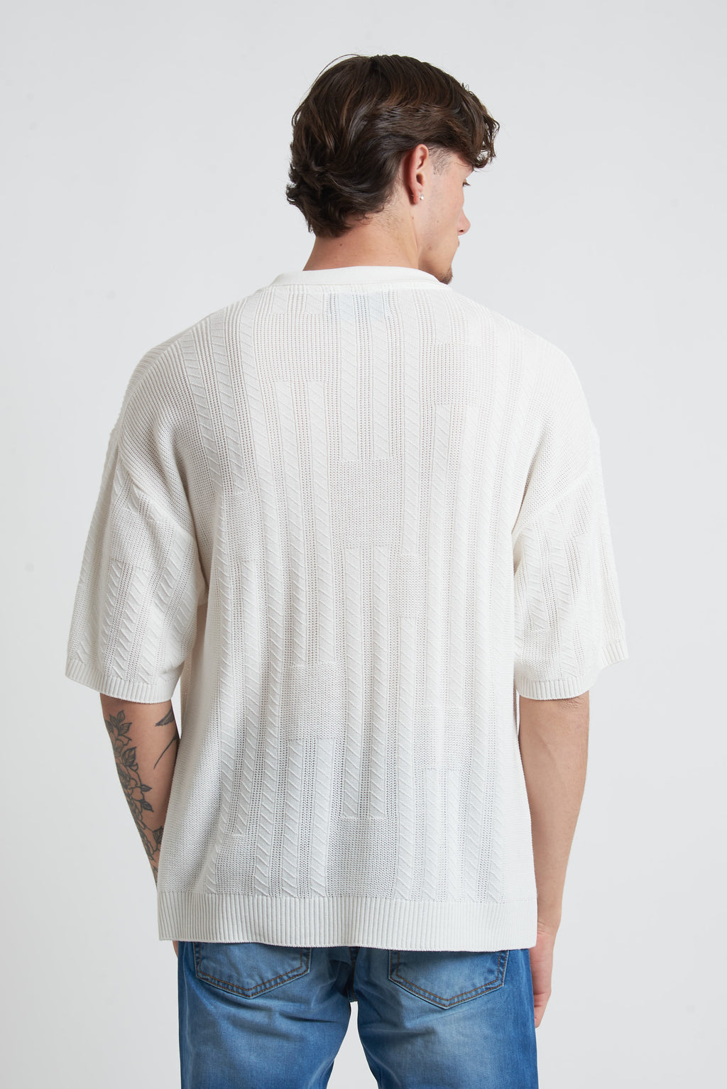 Maglione in filo con spalla scesa