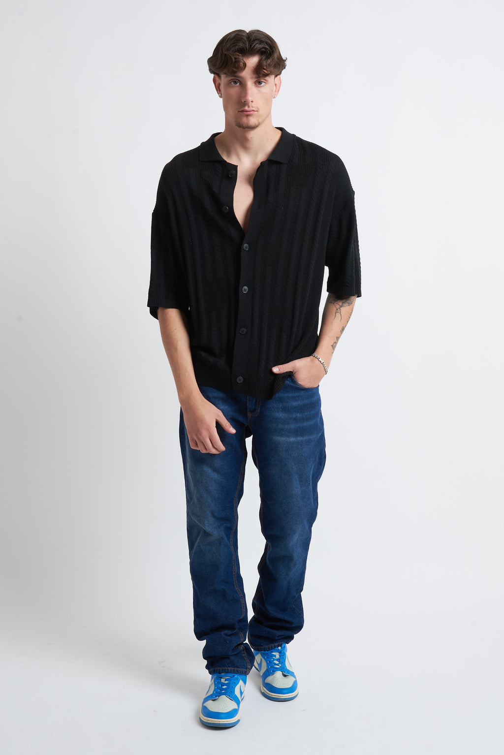Cardigan in filo con spalla scesa
