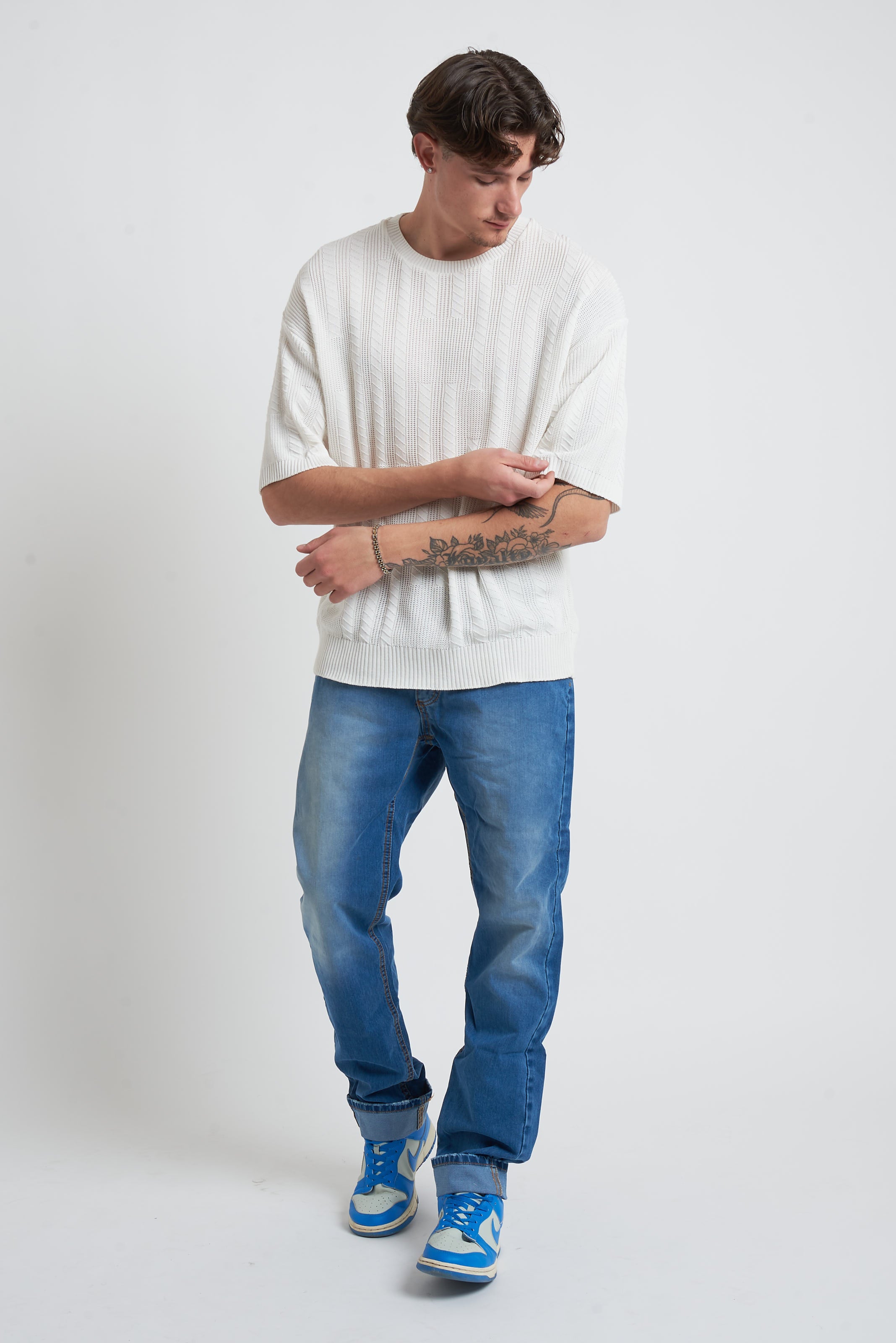 Maglione in filo con spalla scesa