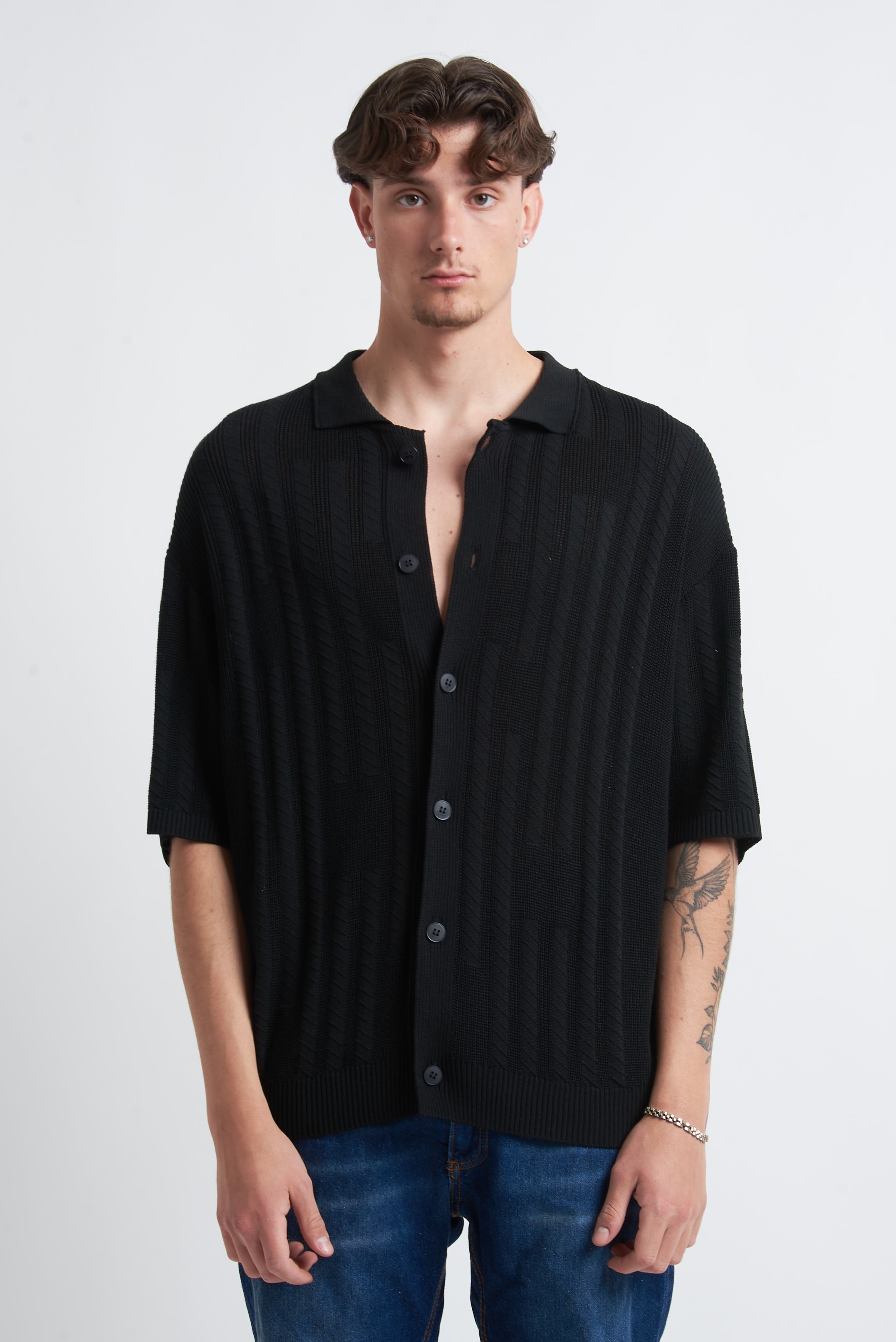 Cardigan in filo con spalla scesa