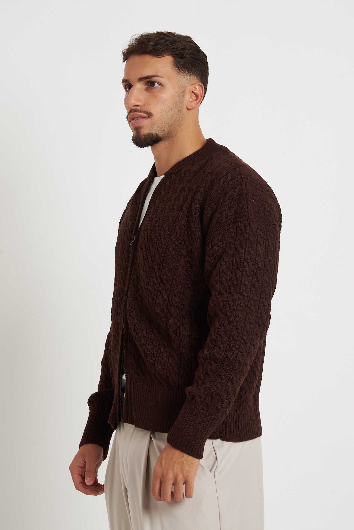 Cardigan in lana con zip e trecce