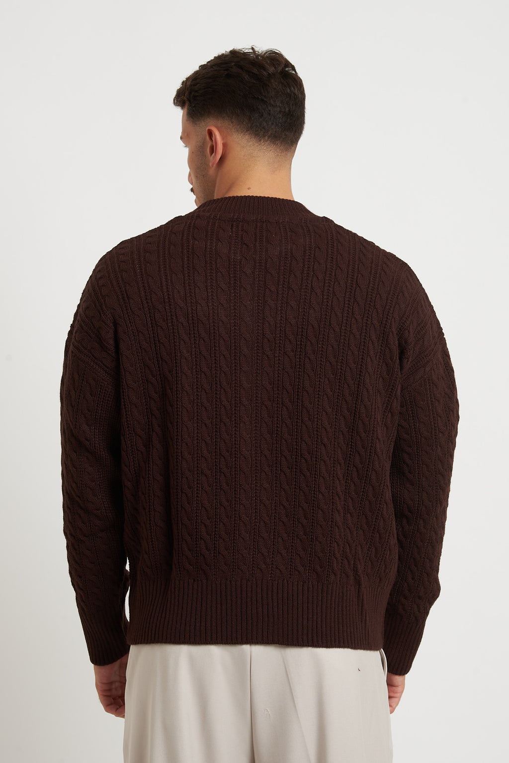 Cardigan in lana con zip e trecce