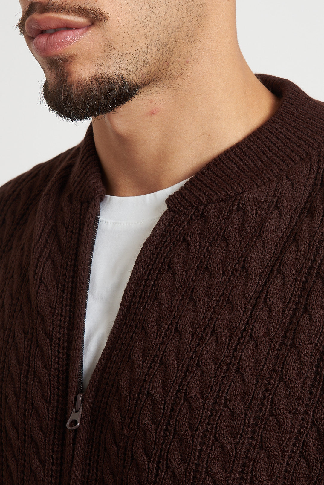 Cardigan in lana con zip e trecce