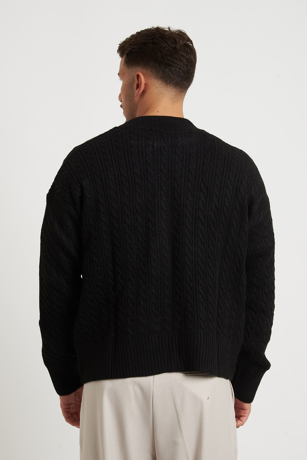 Cardigan in lana con zip e trecce