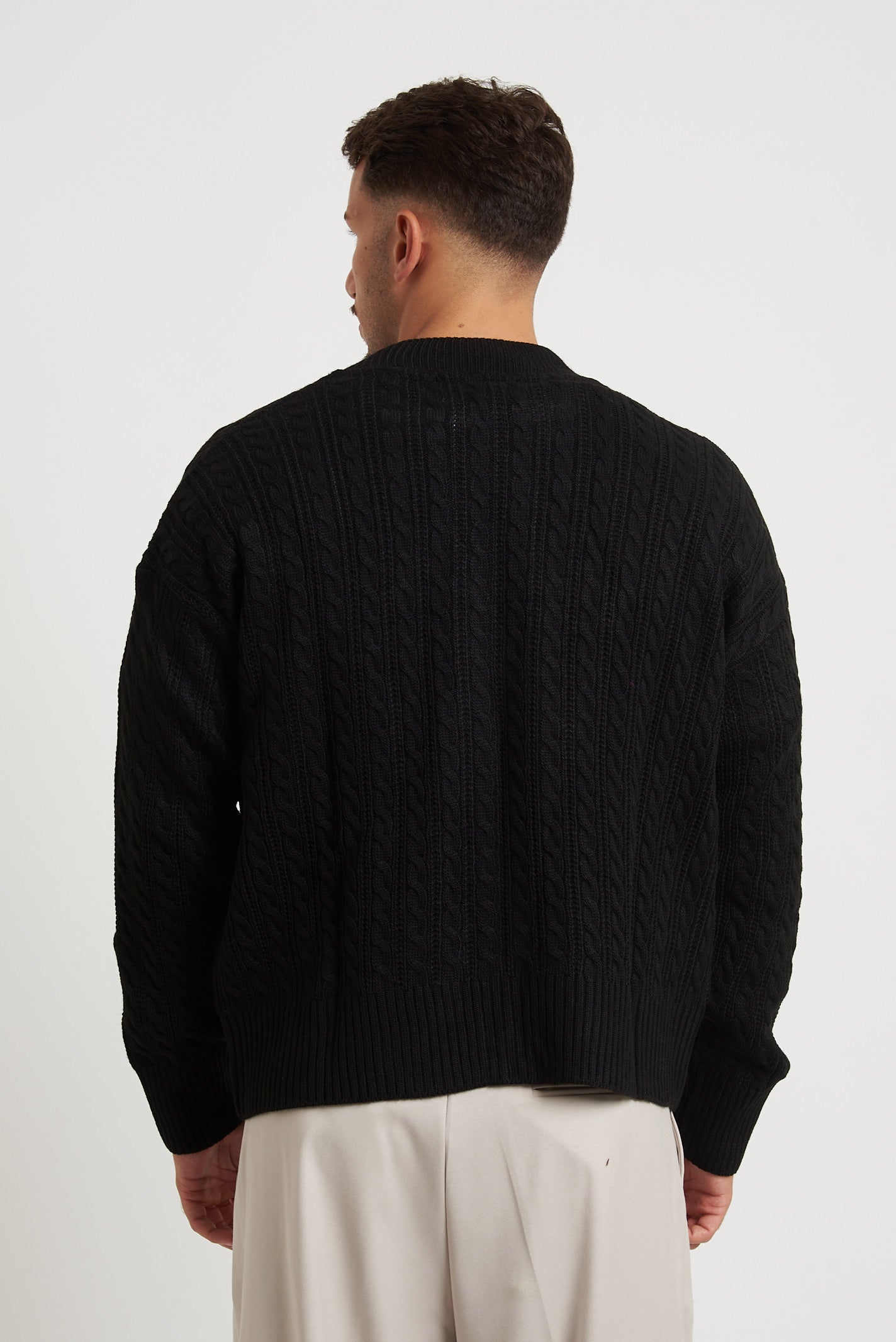 Cardigan in lana con zip e trecce