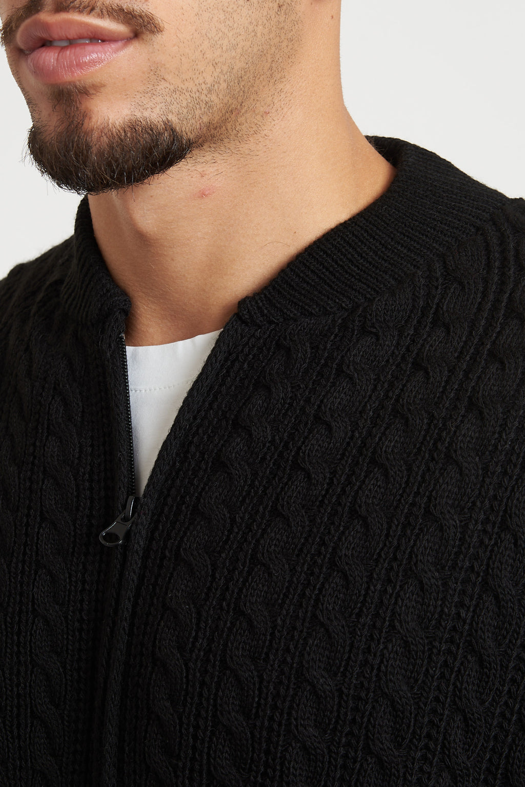 Cardigan in lana con zip e trecce