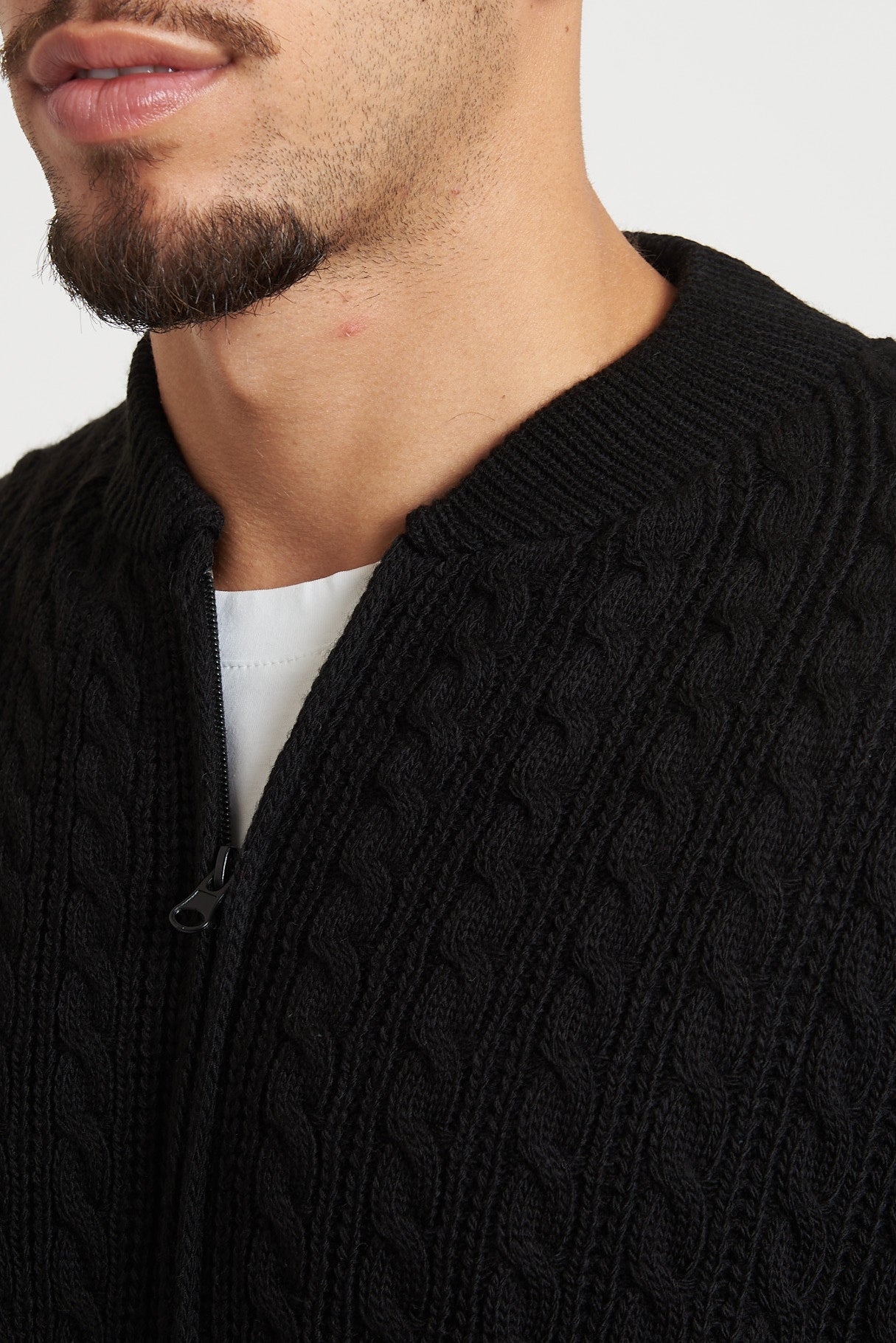 Cardigan in lana con zip e trecce