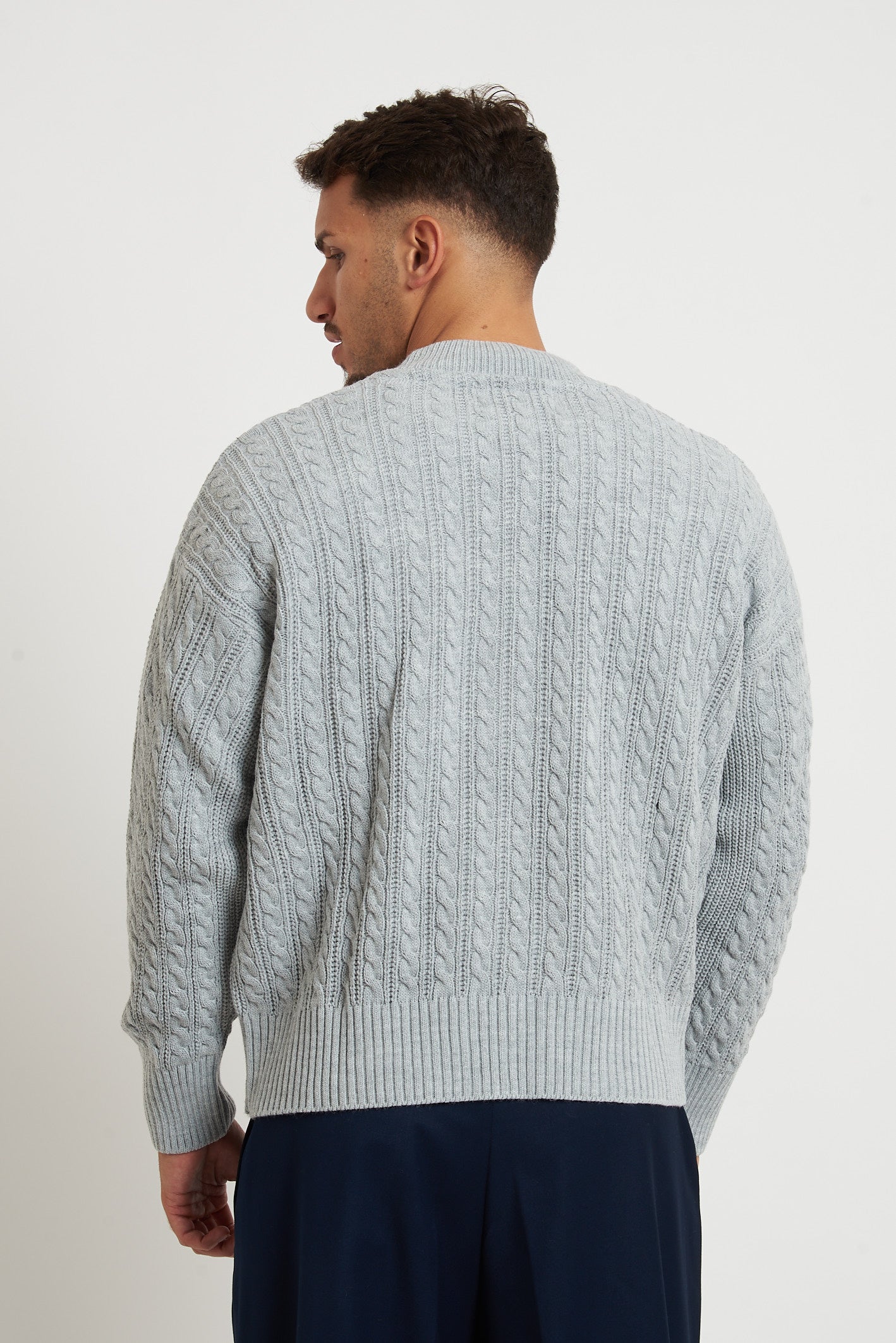 Cardigan in lana con zip e trecce