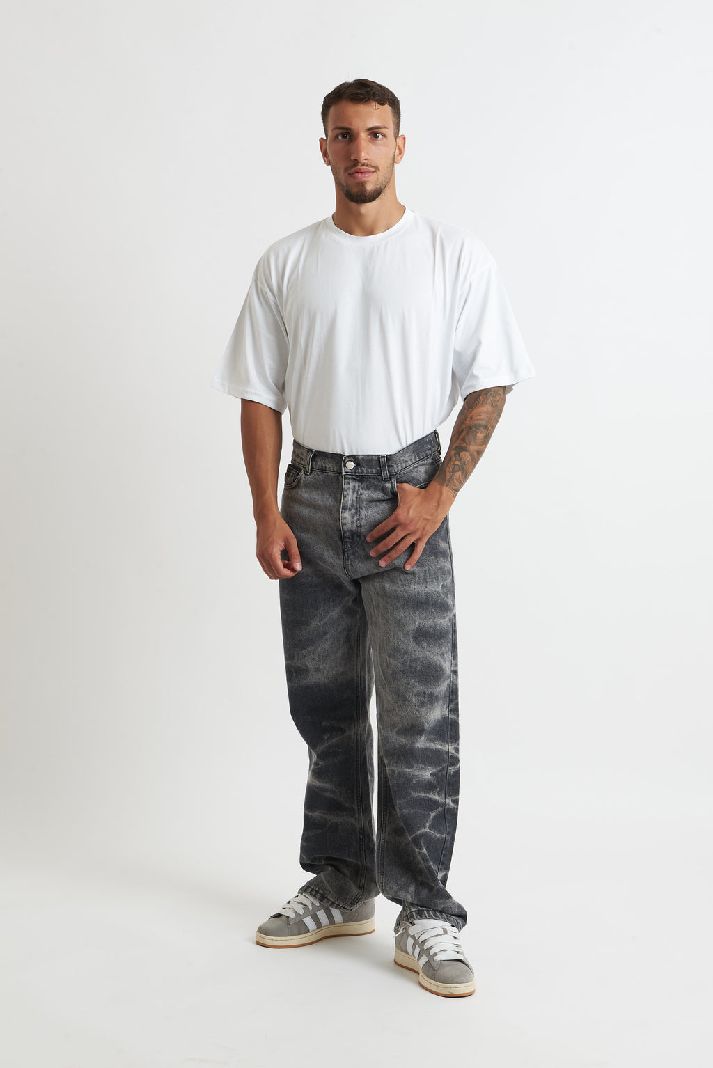 Jeans flare sabbiato maculato