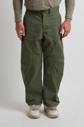 Pantalone balloon in tessuto tecnico con tagli verde